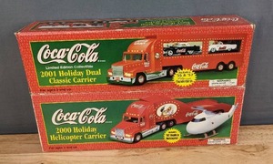 lot 60 image: Coca-Cola Limited Edition Collectible 2001 Holiday Dual Classic Carrier and 2000 Holiday Helicopter Carrier H