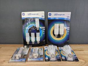 lot 98 image: New Lightbulbs (4) GE 60W LED Bright Stik, (2) GE 100W LED Bright Stik, (2) GE 100W LED Bulbs, Meridian Soft White LED 11W Bulb & 6W Bulb H