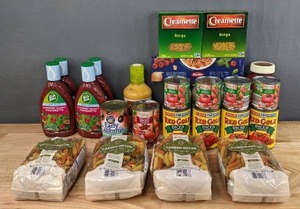 lot 154 image: Assortment of Nonperishable Food Items Garden Rotini, Raspberry Walnut Vinaigrette, Canned Black Olives, Diced Tomatoes, Tomato Sauce, Italian Dressing, Traditional Sauce, Alfredo Sauce, Noodles and Noodle Rings H