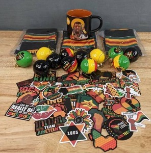 lot 103 image: New (49) Assorted Juneteenth Stickers, Juneteenth Decor, Domo Ink King is Black Coffee Mug, and (3) Class of 2023 Graduation Stoles F