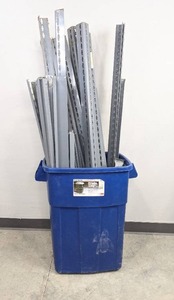 lot 77A image: Shelving Unit in a Tucker Unbreakable 30 Gallon Trash Container H