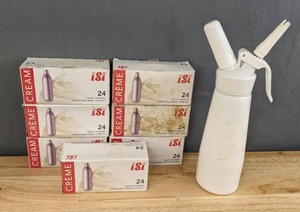 lot 194 image: Isi Whipped Cream Dispenser and 7 Boxes of Whip Cream Chargers H