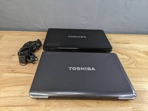 lot 39B image: (2) Toshiba Laptops Models PSLL0U-01H00D and PSK2CU-01C001 H