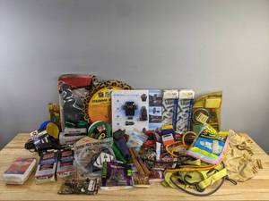 lot 224 image: Assorted Automotive Items - Light Bulbs, Qi Wireless Car Charger, Auto Polish, Rear View Mirror Adhesive, and More H