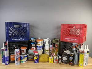 lot 233 image: Home and Auto Maintenance Items with Plastic Storage Crates Engine Oil, WD-40, Popcorn Ceiling Patch, Brake Cleaner, Flame Buster, Windshield Washer Fluid and More  H