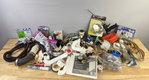 lot 217 image: Assorted Plumbing Supplies - Hoses, Pipes, Connectors, and More H