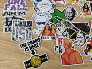 lot 45 image: 50 New Wrestling Stickers WWE Hulk Hogan Flair WWF Stone Cold Sting Mankind Rock Bellas V