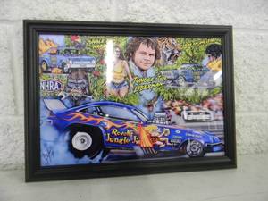 lot 29 image: Jungle Jim Liberman and Pam by FAMOUS ARTIST Tim Phillips - PRINT  PROFESSIONALLY FRAMED - FANTASTIC PIECE - NEW - APPROX 18 By 13 - SEE PICTURES