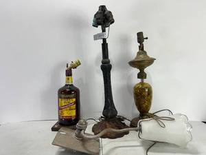 lot 231 image: VARIOUS LAMPS, RUM, ONE FILLED WITH ROCK & PENNIES, CAST IRON, WALL MOUNT