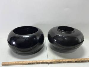 lot 181 image: BLACK PLANT POTS ONE IS HAEGER