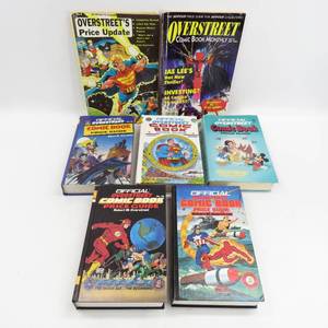 lot 10 image: Grouping of 7 Vintage Overstreet Comic Book Price Guides