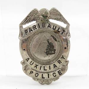 lot 87 image: Vintage Faribault Metal Auxiliary Police Badge