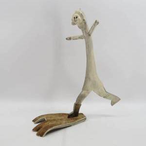 lot 119 image: Excellent Inuit Bone or Antler Carved Running Figure Likely Luke Anowtalik 16.5 Tall