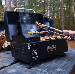 lot 65 image: COUNTRY SMOKERS Portable Pellet Grill CS150PPG (Retails for $224.99)
