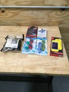 lot 147 image: Lot of - (2) 2 Packs of Swimming Goggles, (2) Nintendo Switch Lite Products, (1) Magnetic Wireless Charger & Hammock Straps