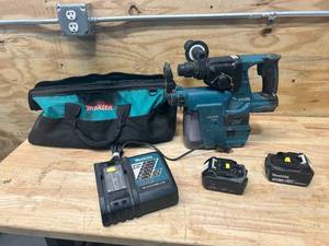 lot 108 image: MAKITA Cordless Hammer Drill with HEPA Filter, Charger, Bag and 2 Batteries (5Ah)