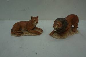 Male and Female Lion Figures
