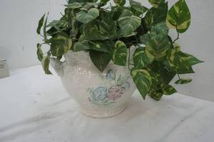 Decorative Porcelain Pot with Green Foliage