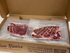 I      Box of Beef Strip Loin Steaks 7.10 LBs