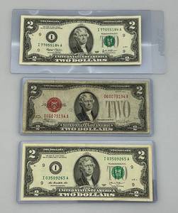 lot 15 image: Misc. U.S. Two Dollar Bills Including 1928 F  Red Seal, 2003 And 2013