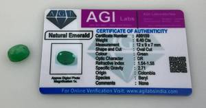 lot 23 image: AGI Labs 6.40 Oval Cut Natural Emerald With COA