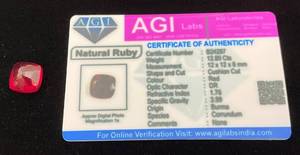 lot 34 image: AGI Labs 12.80 Cts Cushion Natural Ruby With COA