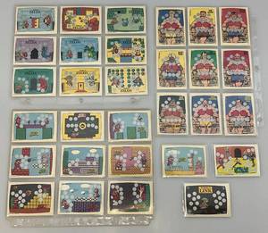 lot 174 image: 1980s Topps NINTENDO Scratch-Off Game Cards (Most In Protective Sleeves)