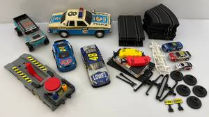 lot 234 image: Misc. Vintage Toys Including Battery Operated Police Car & More