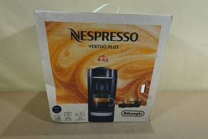 lot 10 image: Nespresso Vertuo Plus Coffee Maker