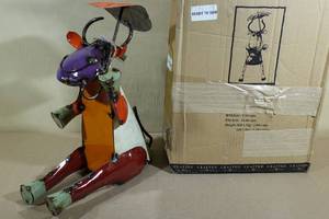 lot 35 image: Crafted Lawn Ornament Cow