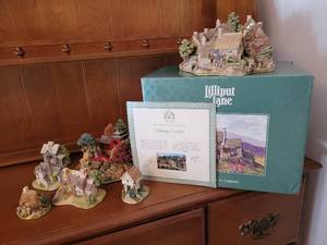 lot 54 image: Lilliput Lane Figurines with Chipping Coombe and Reflection of Jade and some miniatures