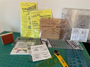 lot 49 image: Quilting Rotary Cutting Mat with Cutter and Various Quilting Rulers