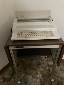 lot 79 image: AEG Olympia Mastertype 2 Typewriter & Stand