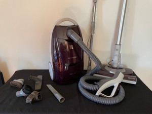 lot 48 image: Kenmore Progressive Canister Vacuum with Attachments and Replacement Bags