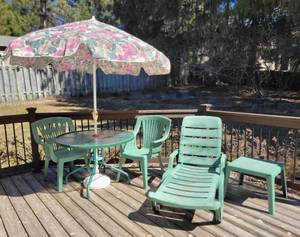 lot 67 image: Glass Patio Table with Plastic Chairs, Lounger, Table and Umbrella