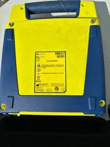 lot 59 image: MSRP $1600 Cardiac Science&nbspG3 9390A-501 PowerHEART AED&nbspEmergency Defibrillator WBattery & 124 Pads- Great Working Condition
