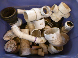 lot 243 image: Tote Full of PVC Pipe