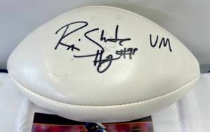 lot 43 image: RaShede Hageman Signed Football and Photo - University of Minnesota - Official NFL Wilson Football - Case Included