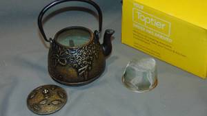 lot 137 image: TOPTIER Tea Kettle for Stove Top, Cast Iron Teapot Stovetop Safe with Infusers for Loose Tea,