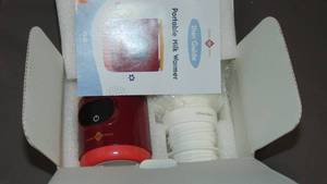 lot 155 image: Portable Bottle Warmer for Breastmilk  Instant Breastmilk & Formula Heating   Travel   Idaho Jones
