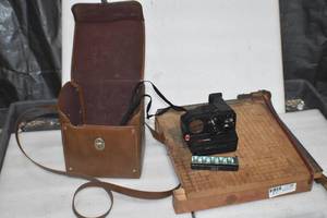 Vintage Polaroid and paper cutter