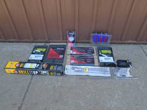 Assortment of BBQ grill repair parts. Grates, Thermometers, etc. As shown.