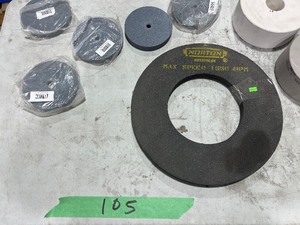 TABLE FULL OF GRINDING WHEELS