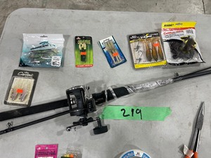 TABLE FULL OF CATFISH LURES, LINE, HOOKS, & ROD