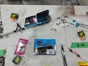 TABLE FULL OF CATFISH LURES, LINE, HOOKS, & ROD