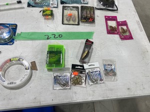 TABLE FULL OF CATFISH LURES, LINE, HOOKS, & ROD