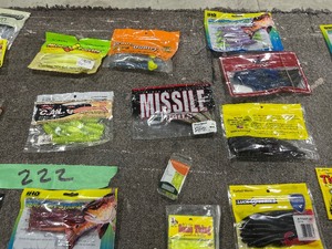 TABLE FULL OF FISHING PLASTICS