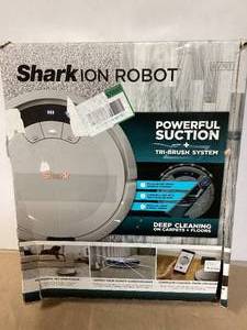lot 67 image: Shark ION 12.6in Robotic Vacuum, Wi-Fi Connected, Bagless, HEPA Filter for Multisurface Floor-to-Carpet in Gray Customer Returns See Pictures
