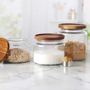lot 148 image: Anchor Hocking Glass Jars with Acacia Lids, Set of 3