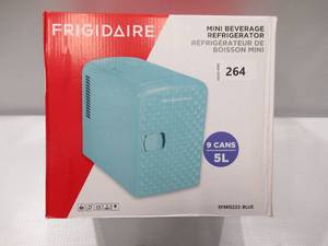 lot 264 image: NEW Frigidaire Diamond 9 Can Mini Beverage & Skin Care Cooler - Baby Blue